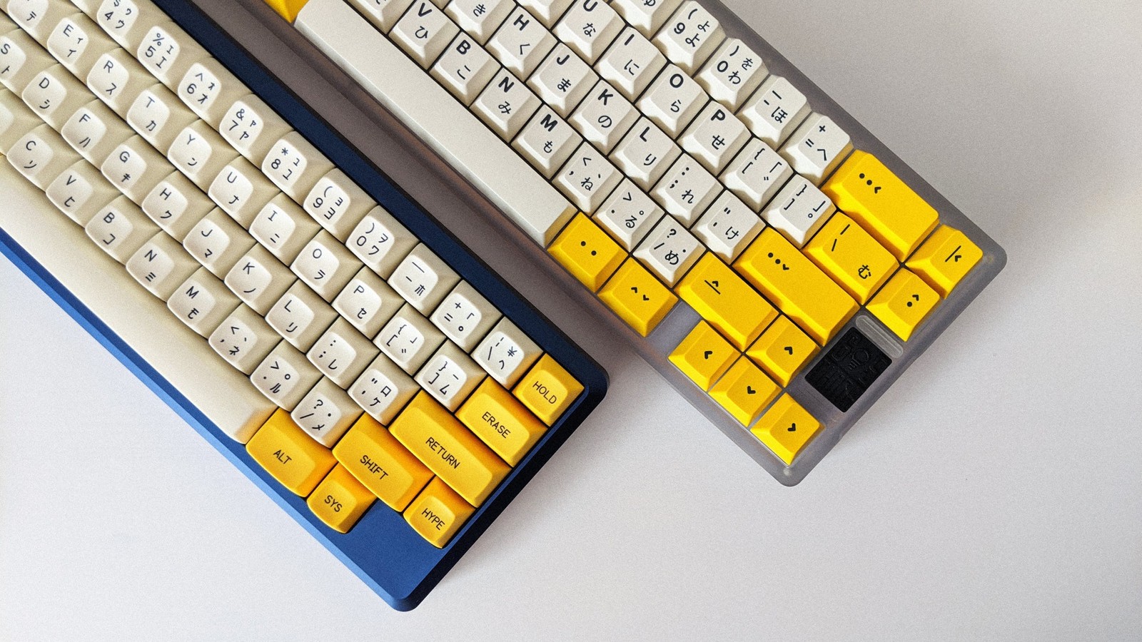Two keyboards next to each other; GMK Serika on Think 6.5 and MT3 Serika on Tokyo60